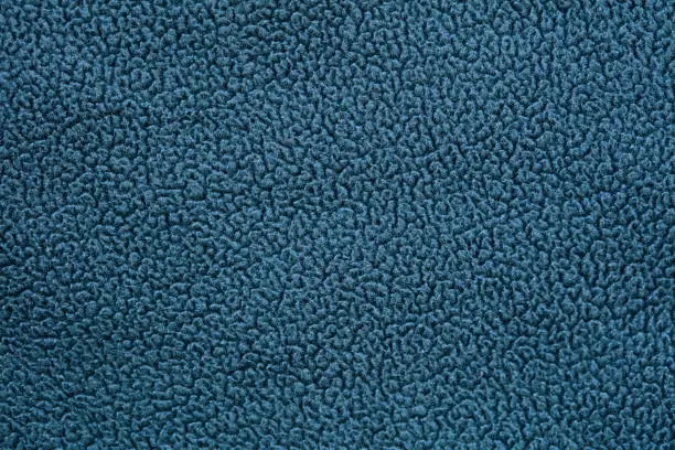 Photo of Close shot of simple blue fleece fabric