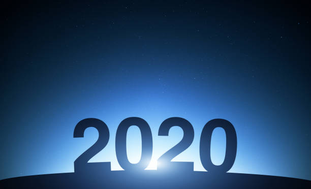 istock New year 2020 text on blue night sky silhouette 1175799166