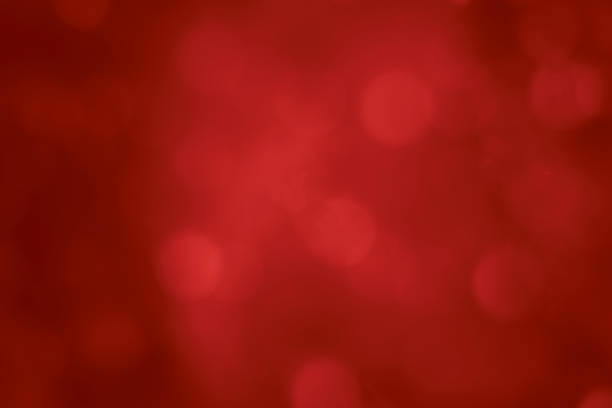 istock red lens flare blur festive lights round specks 1175802913