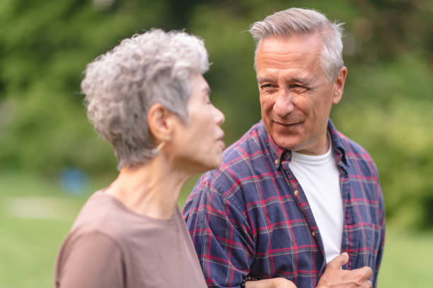 istock Retired couple hiking in forest 1175803651
