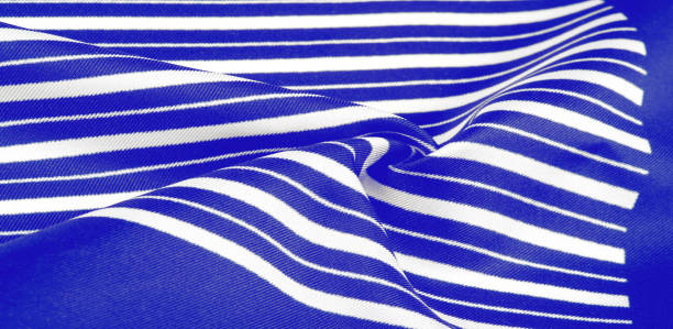 istock silk striped fabric. blue white stripes. This beautiful, super soft, medium-sized silk blend is perfect for your design projects. It is brushed on the back for a luxurious feeling. 1175803963