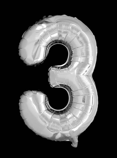 istock Silver Foil Number Balloon on Black 1175808409