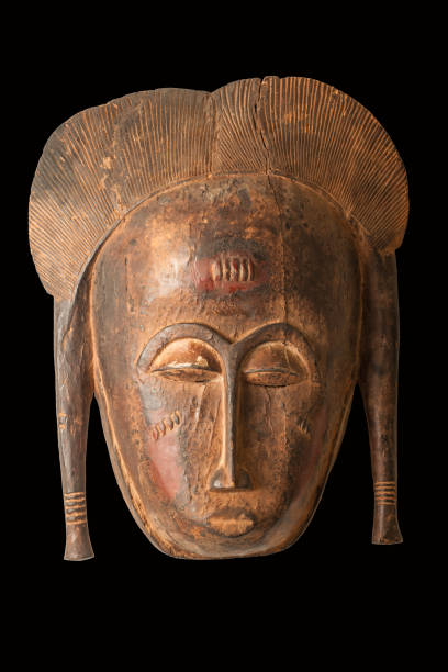istock African Female Carved Mask 1175809076