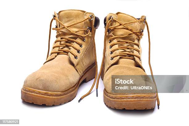 Pair Of Old Yellow Boots Stock Photo - Download Image Now - Boot, Brown, Color Image