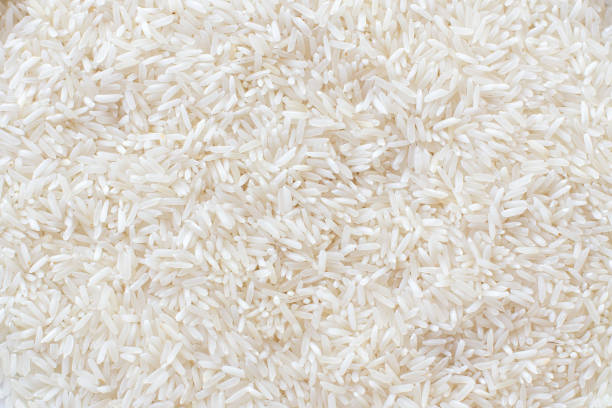 Many rice close up texture background Many rice close up texture background basmati rice stock pictures, royalty-free photos & images