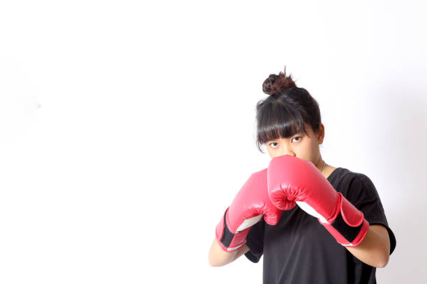 training - fist women punching asian ethnicity stock-fotos und bilder