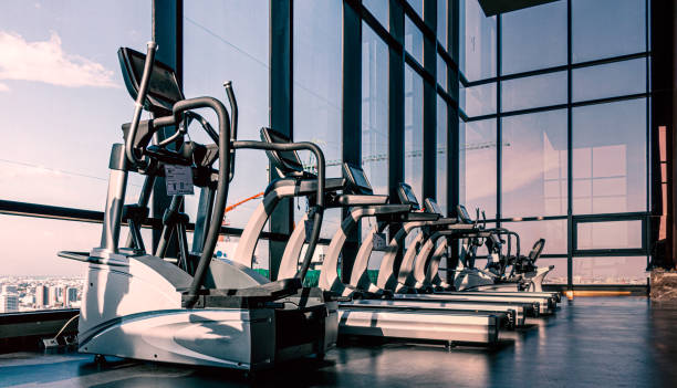 Fitness machine in fitness room in the morning stock photo