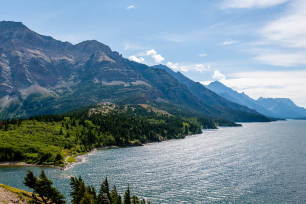 Waterton Lakes National Park The Prince of Wales Hotel and Waterton Lakes vistas from around the shoreline in Alberta, Canada. cameron montana stock pictures, royalty-free photos & images