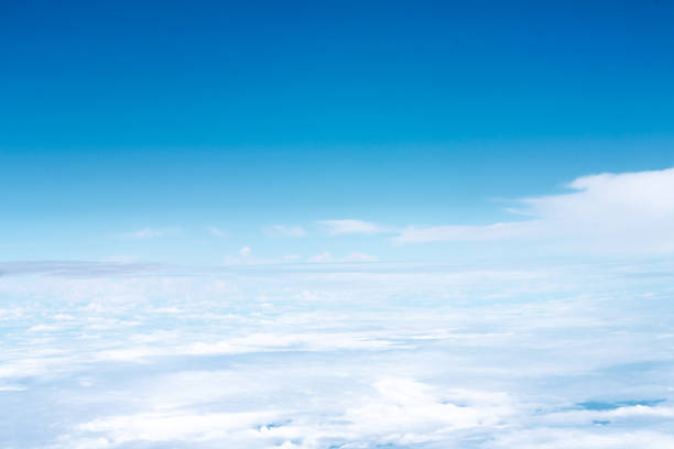 istock Patterns of white clouds view on bright blue sky background , copy space 1175817699