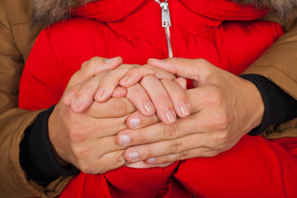 istock Couple holding hands on wintertime 1175822477