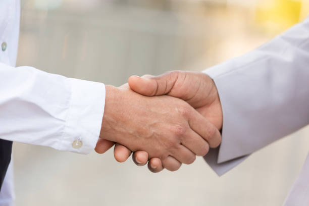 istock Closeup of business professionals handshake 1175823385