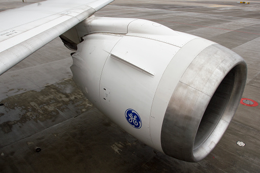 Shanghai, China - June 13, 2019: The GE turbine engine on a Boeing 787 dreamliner passenger aircraft at Shanghai Pudong International Airport.