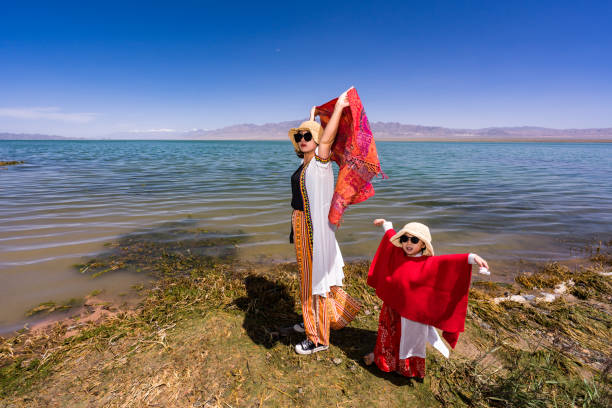 mother and daughter by the lake side
