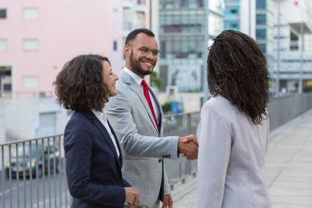 istock Cheerful satisfied partners finishing up meeting 1175832536