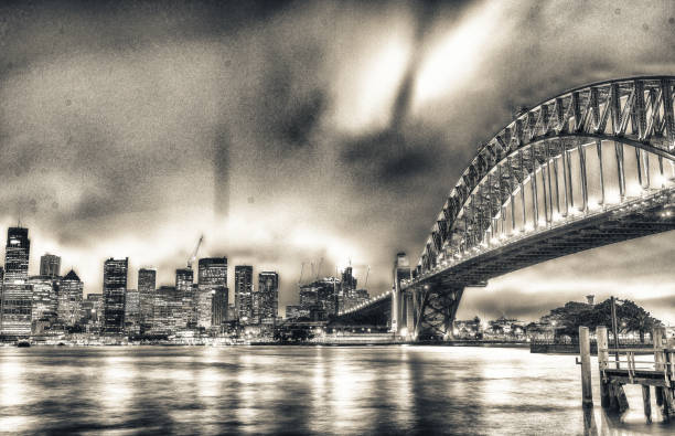istock SYDNEY - OCTOBER 2015: Sydney Harbour Bridge. Sydney attracts 20 million tourists annually 1175832776
