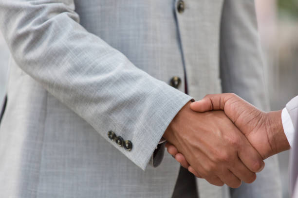 istock Closeup of handshake 1175834265