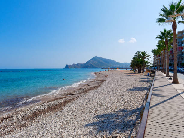 istock long beach in Altea. In the background beautiful hills.. Spain. 1175835198