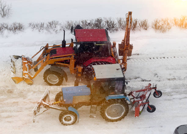 istock Red and blue tractor for snow cleaning. 1175838662