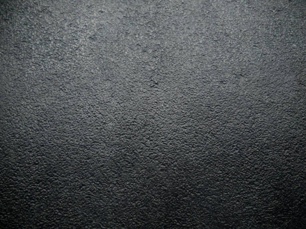 istock Black wall background. Rough black wall texture. Black Wallpaper 1175838761