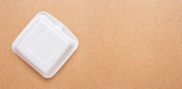 istock Foam food container on plywood background. 1175839083