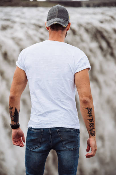 istock tourist explorer at gulfoss waterfall in iceland 1175839485