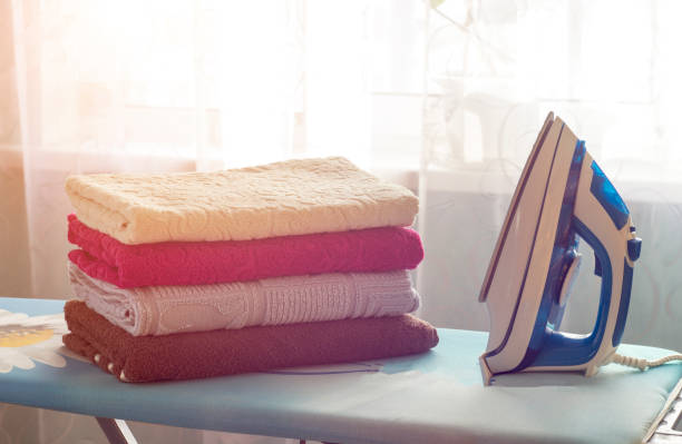 istock Iron, ironing board and towels 1175847841