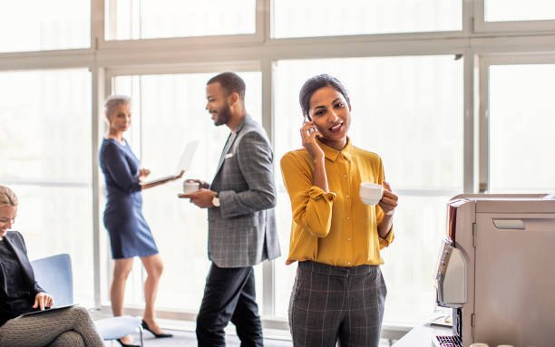 istock Business people having a break, drinking coffee 1175854235