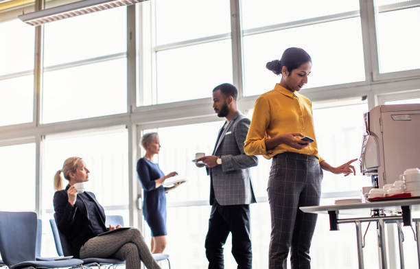 istock Business people having a break, drinking coffee 1175854283