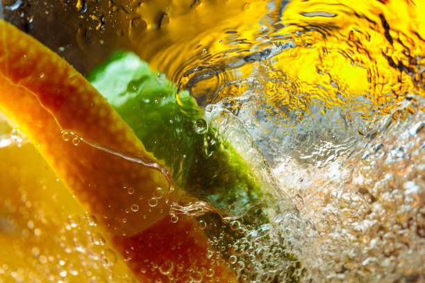 istock Carbonated drink or cocktail with lemon, abstract splashing. 1175858093