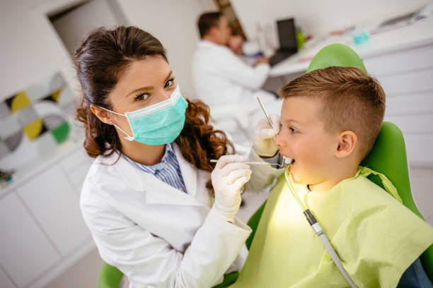 istock Little boy at dentist's office 1175860250
