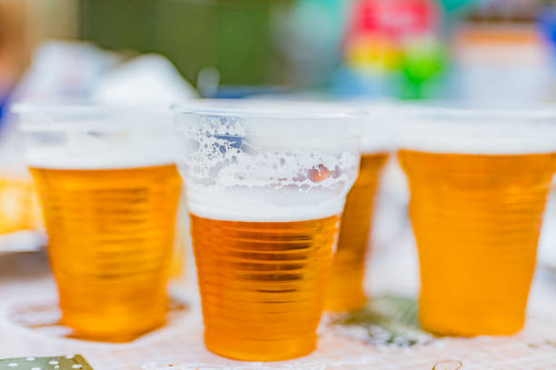 istock Beer glasses on a picnic table in the backyard. 1175860443