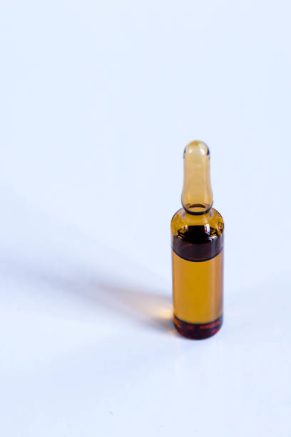 istock vial with drug for injection on white background 1175860672