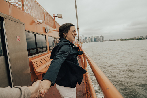 Family in a Ferry in New York city