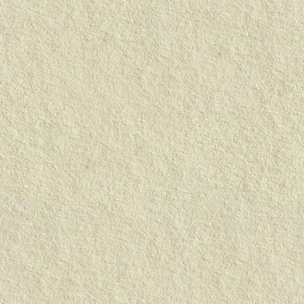 istock Seamless square texture. Recycled paper texture background in light cream sepia color tone. 1175863682