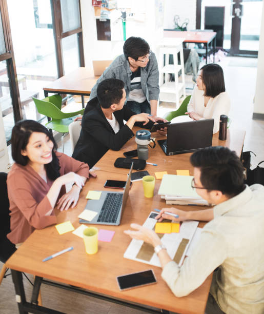 istock Asian colleagues having a meeting 1175864351