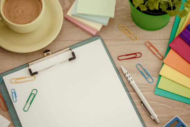 istock Clipboard with blank paper, adhesive notes and office supplies 1175867278