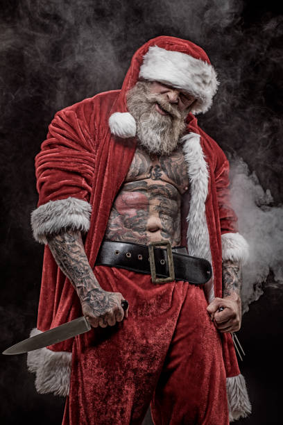 istock Bad Santa Claus with knives 1175868685