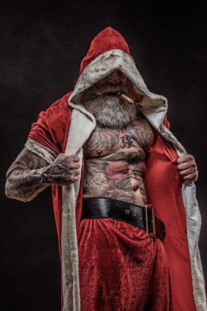 istock Bad Santa Claus with gun 1175869123