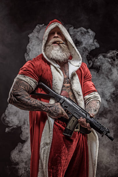 istock Bad Santa Claus with gun 1175869908