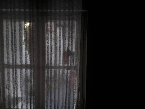 istock Dark room and curtain window 1175870111