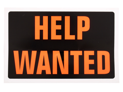 a help wanted sign isolated on white.