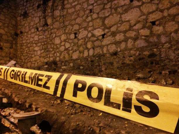 Yellow caution do not enter tape at a crime scene