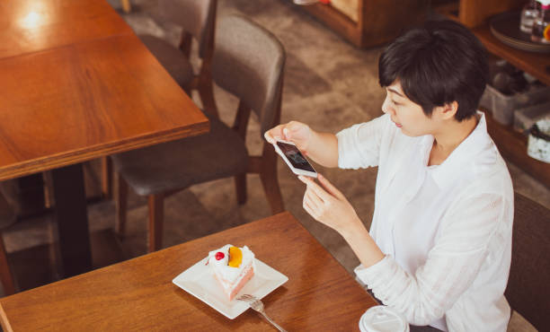 istock Woman enjoying cake 1175873132