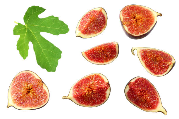 istock Fig fruit with green leaf and slices isolated on white background Top view 1175878615
