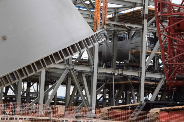 istock Installation of distillation column at an oil refinery. 1175879329