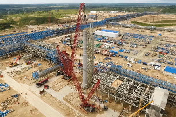 istock Installation of distillation column at an oil refinery. 1175879363