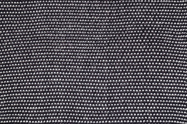 istock Abstract black and white knitted textured blended yarn background. View from above. Close-up 1175880075