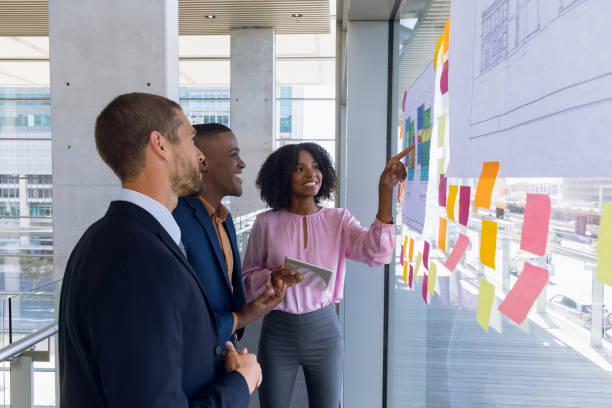 istock Young business people working in modern office 1175883254