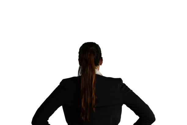 istock Back view of young businesswoman 1175886228