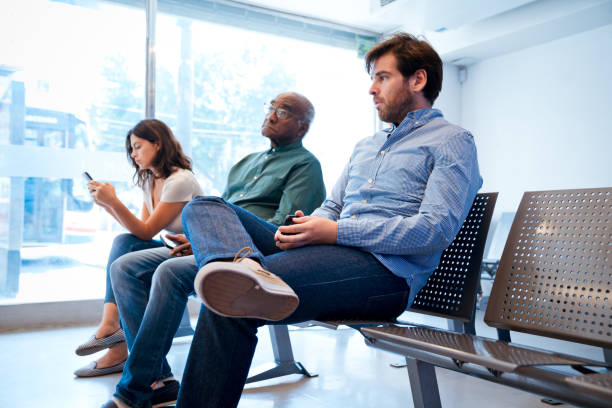 istock Multi-ethnic patients sitting at waiting room 1175886888